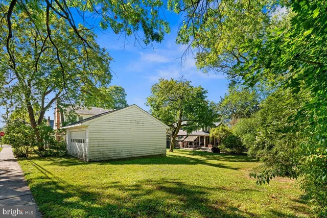 a view of a back yard of the house