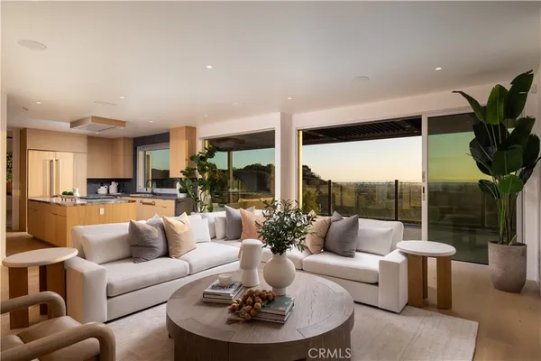 a view of a living room and dining room