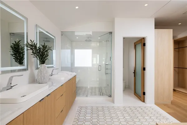 a living room with stainless steel appliances kitchen island granite countertop furniture and a window