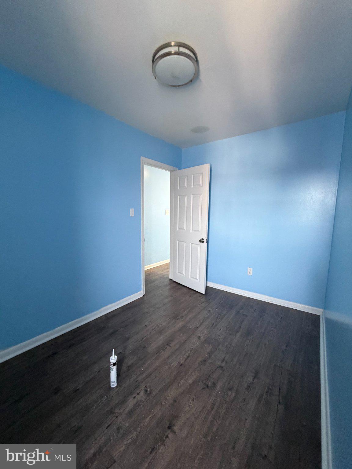 539 Gold Street Baltimore, MD 21217 - Photo 14 of 23 Bright and airy blue room awaits you.