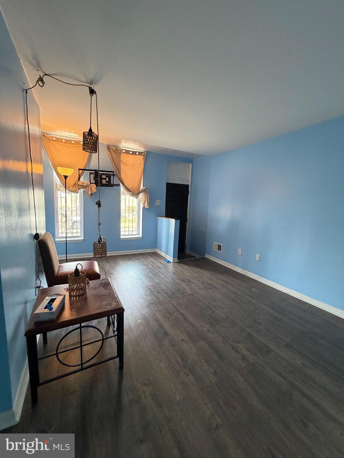 539 Gold Street Baltimore, MD 21217 - Photo 4 of 23 Bright and airy blue living space.