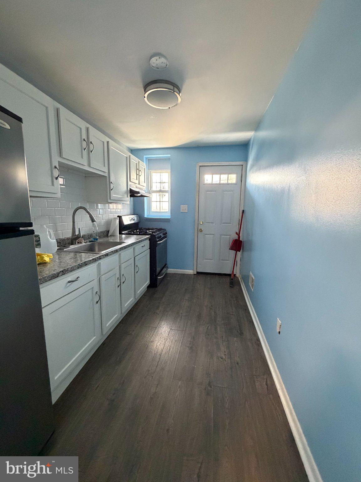 539 Gold Street Baltimore, MD 21217 - Photo 9 of 23 Bright and airy kitchen with charm.