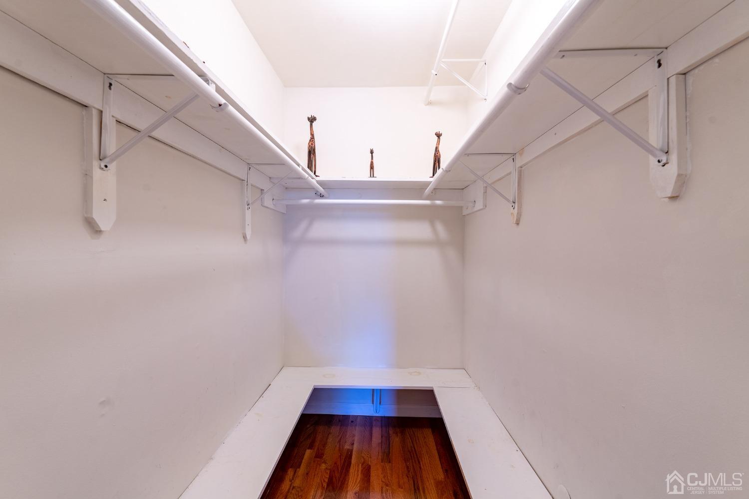 93 Fox Road, Unit 7A Edison, NJ 08817 - Photo 13 of 21 a view of a room with racks on the wall