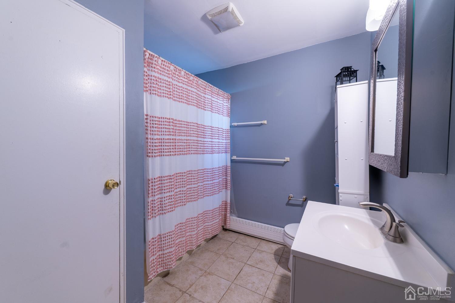 93 Fox Road, Unit 7A Edison, NJ 08817 - Photo 14 of 21 a bathroom with a sink and shower