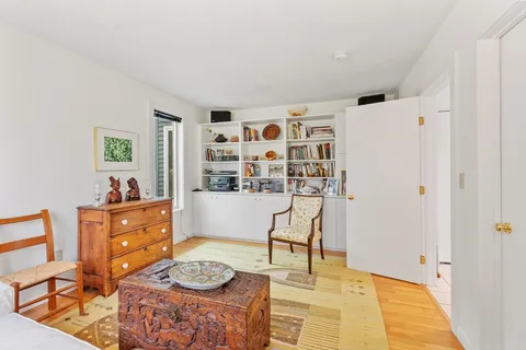 a living room with furniture and decor