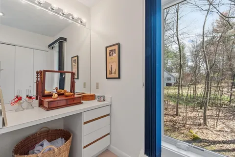 a room with furniture and window