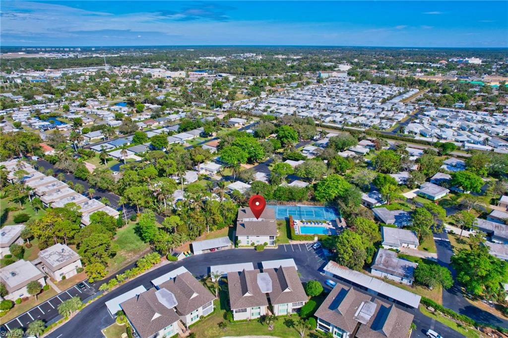 115 Georgetown Boulevard, Unit 115 Naples, FL 34112 - Photo 37 of 45 a view of a city