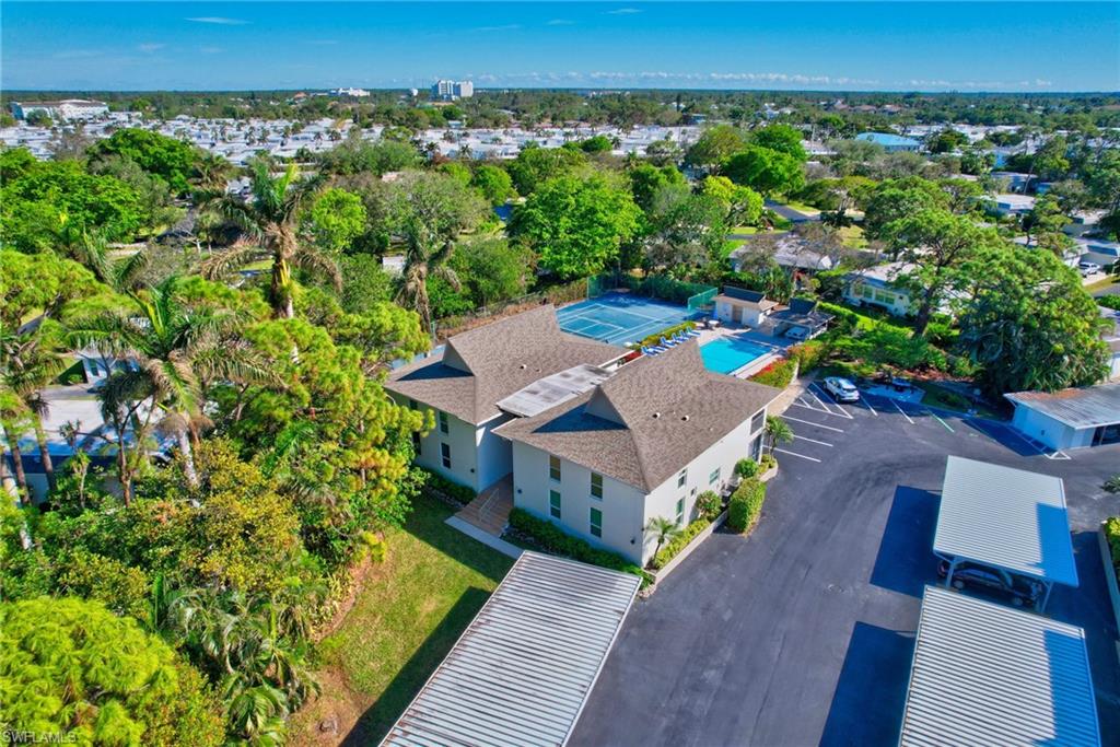 115 Georgetown Boulevard, Unit 115 Naples, FL 34112 - Photo 41 of 45 an aerial view of a house with a yard