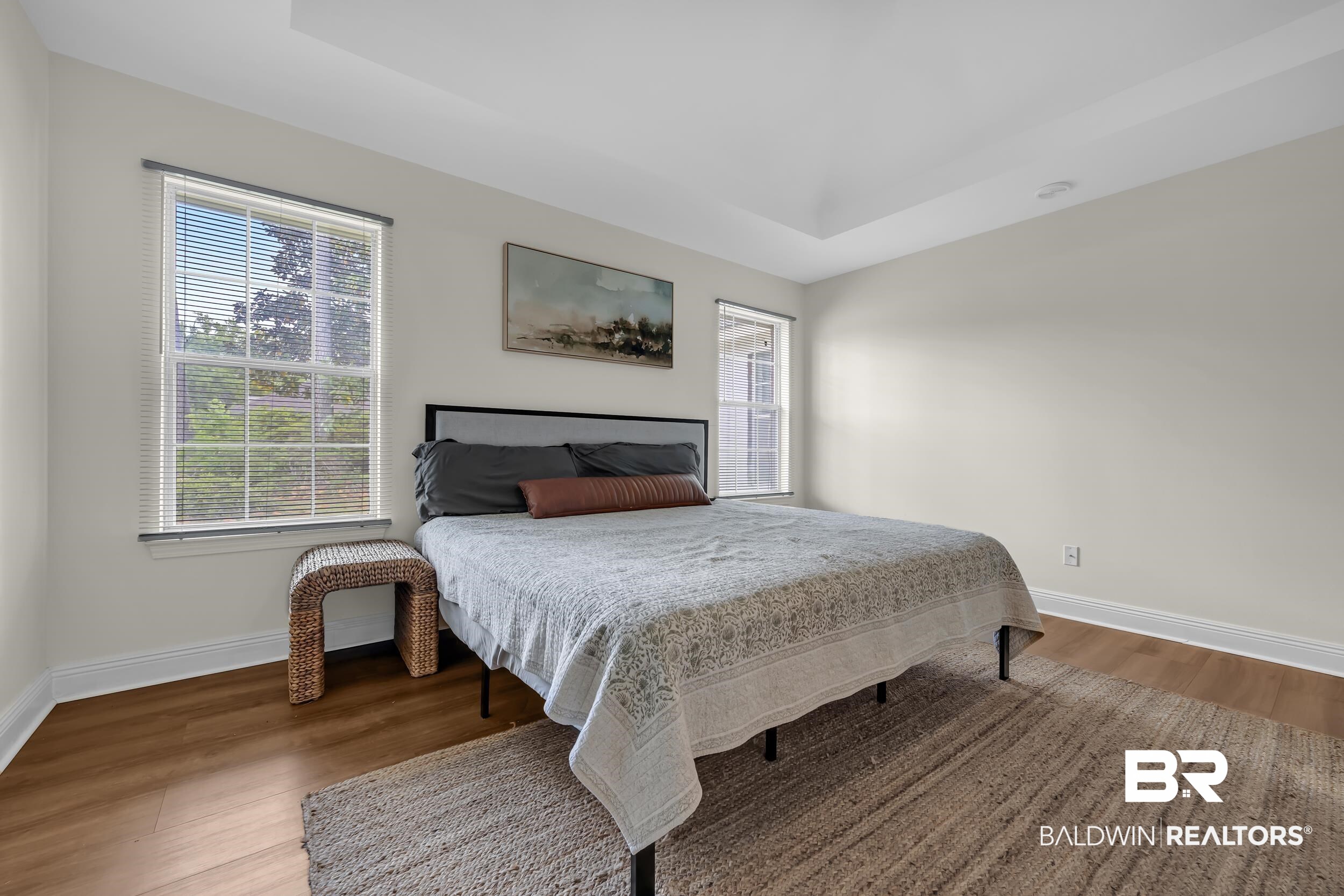 509 Loblolly Court Foley, AL 36535 - Photo 13 of 26 Recessed ceiling with integrated lighting, wood-finish flooring, and white trim