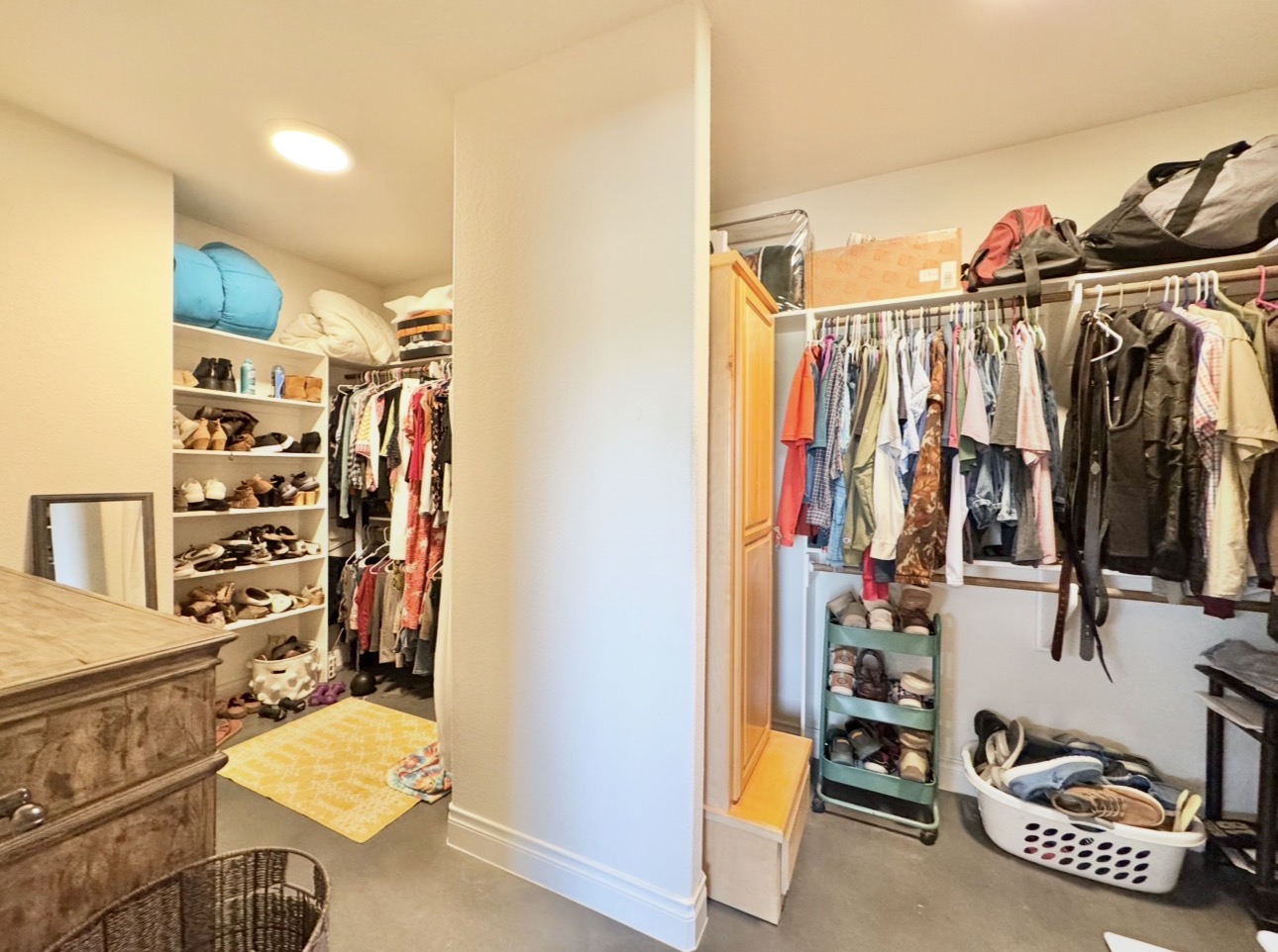 1094 Raintree Lane Elgin, TX 78621 - Photo 28 of 36 Massive master walk-in closet with his and her sections and built in shelving.