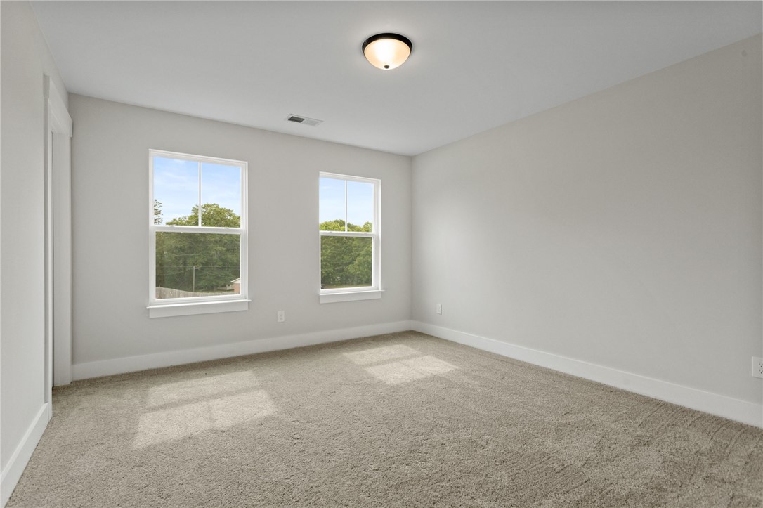 313 Old Shirley Road Central, SC 29630 - Photo 16 of 30 This spacious room provides a bright and airy atmosphere with ample natural light.