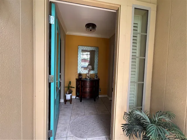 a view of livingroom with furniture and closet