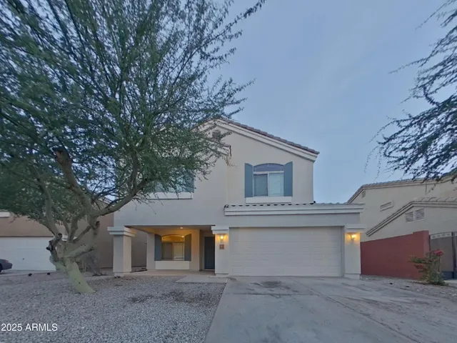 a house view with a outdoor space