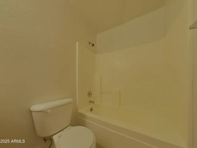 a view of a room that has a window in it