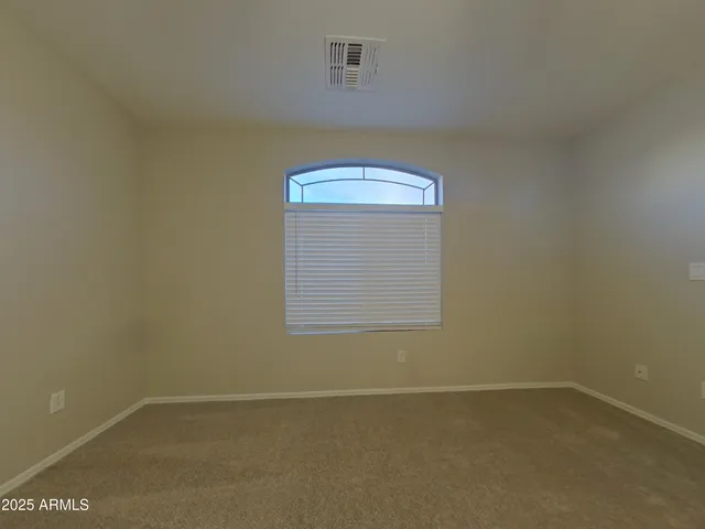 a kitchen with kitchen island a sink a stove and a refrigerator