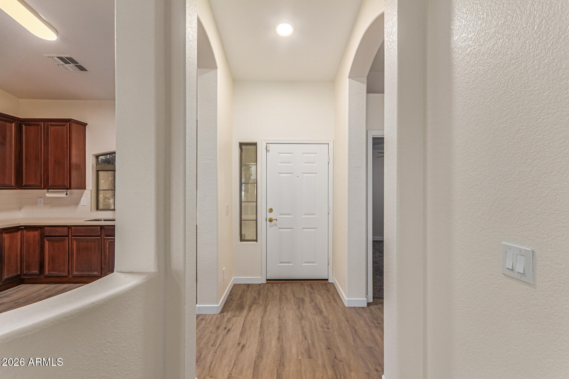 2101 South Meridian Road, Unit 428 Apache Junction, AZ 85120 - Photo 12 of 23 a view of a kitchen from the hallway