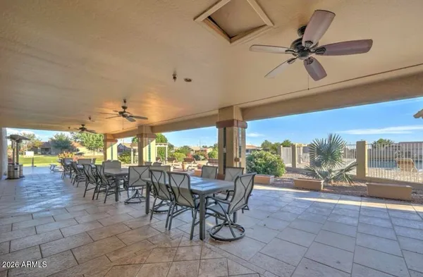 a view of a big house with a big yard