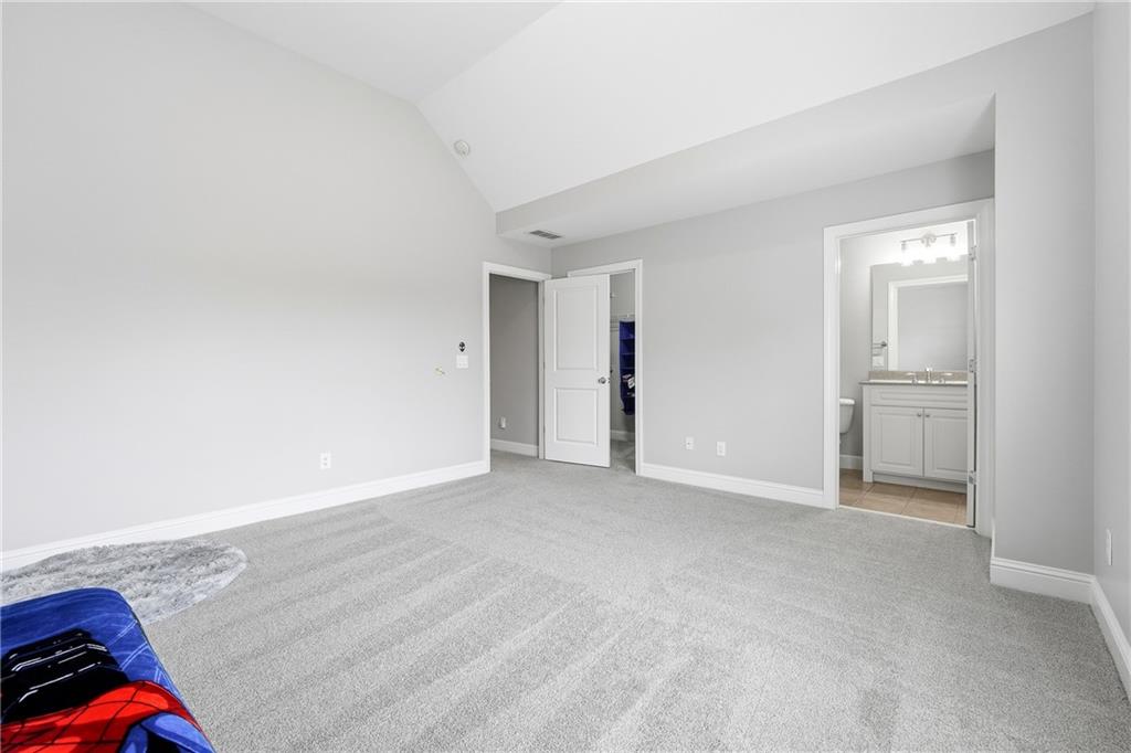 2555 Weddington Ridge Northeast Marietta, GA 30068 - Photo 37 of 65 a view of an empty room and wooden floor