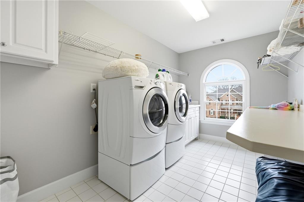 2555 Weddington Ridge Northeast Marietta, GA 30068 - Photo 43 of 65 a utility room with dryer and washer