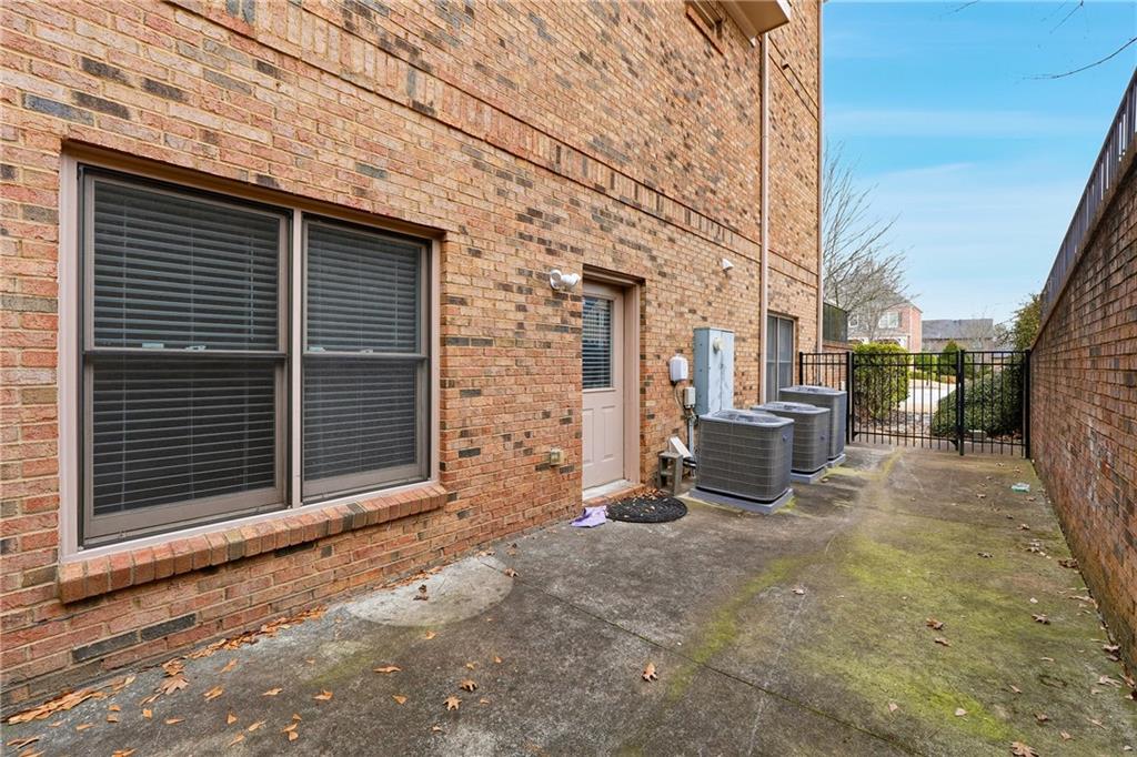 2555 Weddington Ridge Northeast Marietta, GA 30068 - Photo 55 of 65 a view of a house with a patio