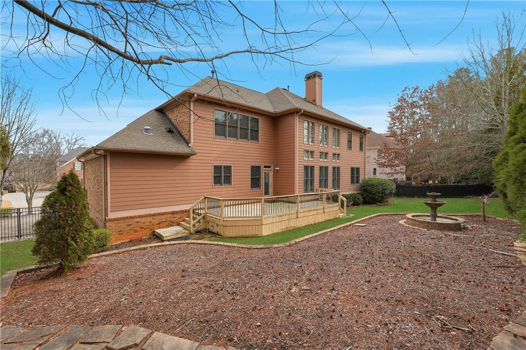2555 Weddington Ridge Northeast Marietta, GA 30068 - Photo 59 of 65 a view of a house with backyard