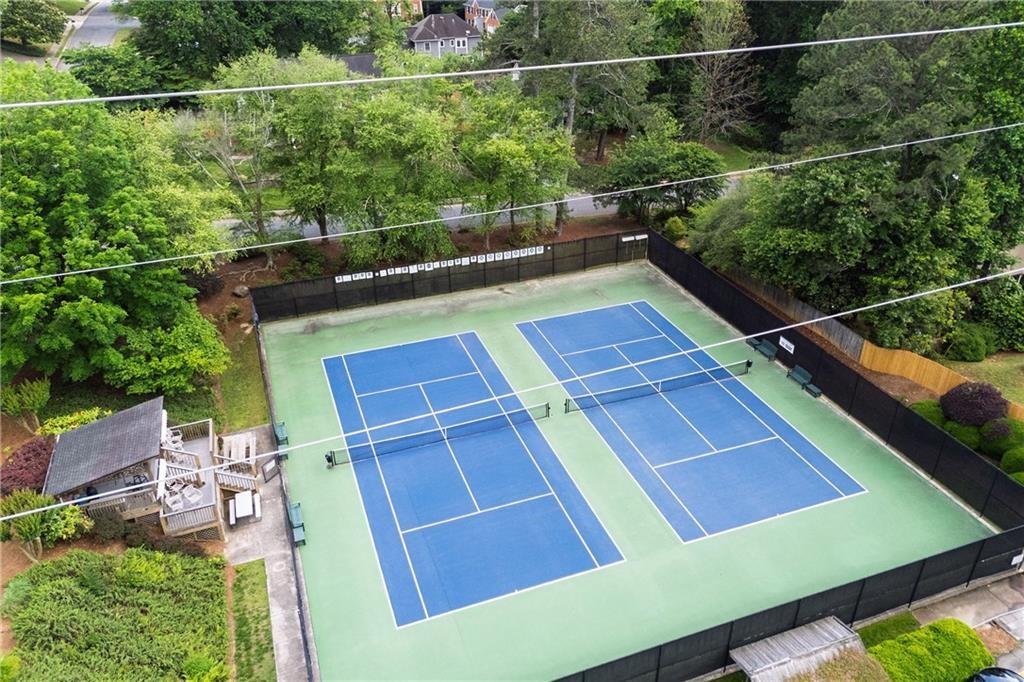 2555 Weddington Ridge Northeast Marietta, GA 30068 - Photo 65 of 65 a view of a chairs and table on the deck