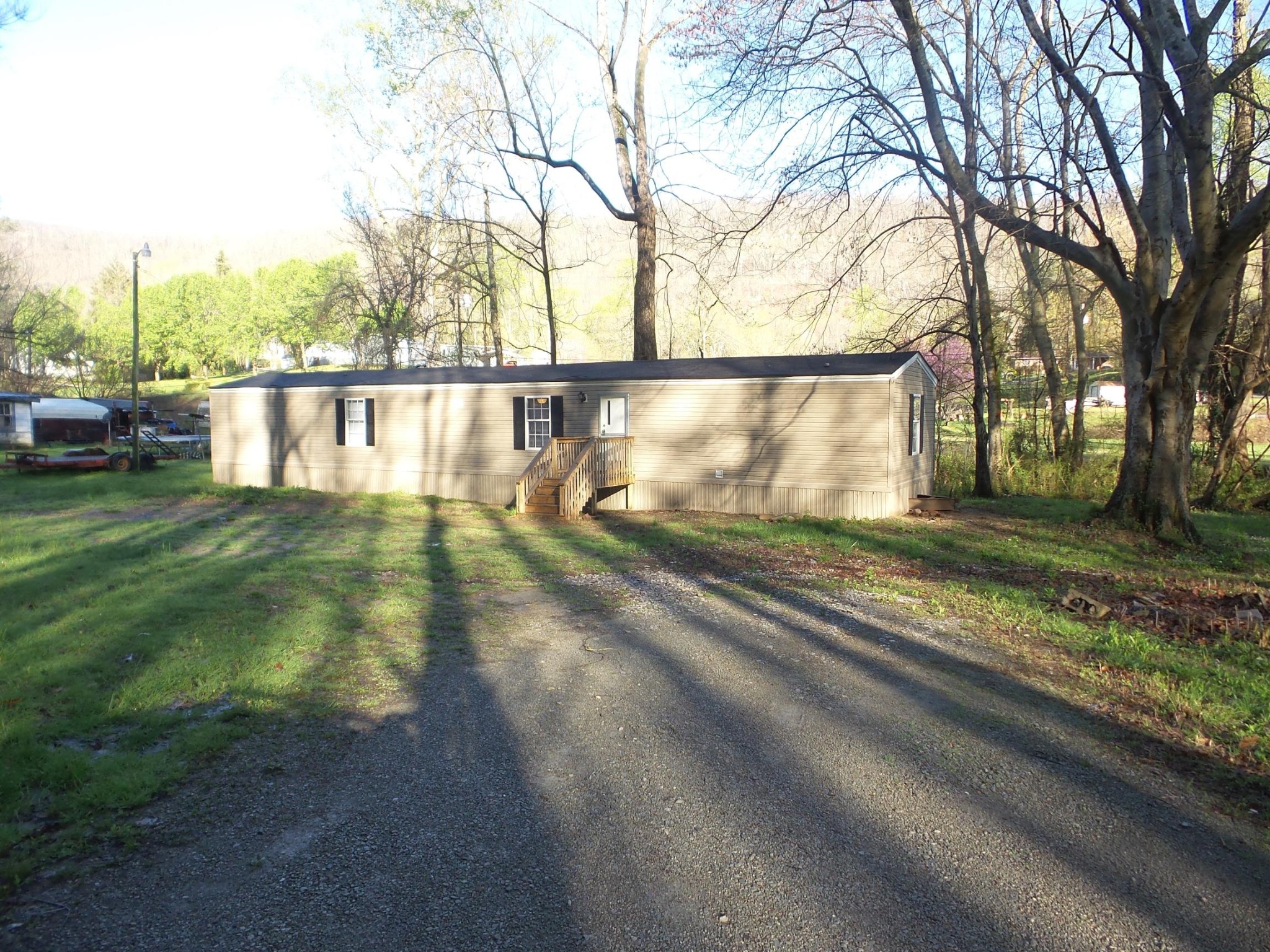 386 Ideal Valley Road Spring City, TN 37381 - Photo 1 of 12 a view of street from a yard