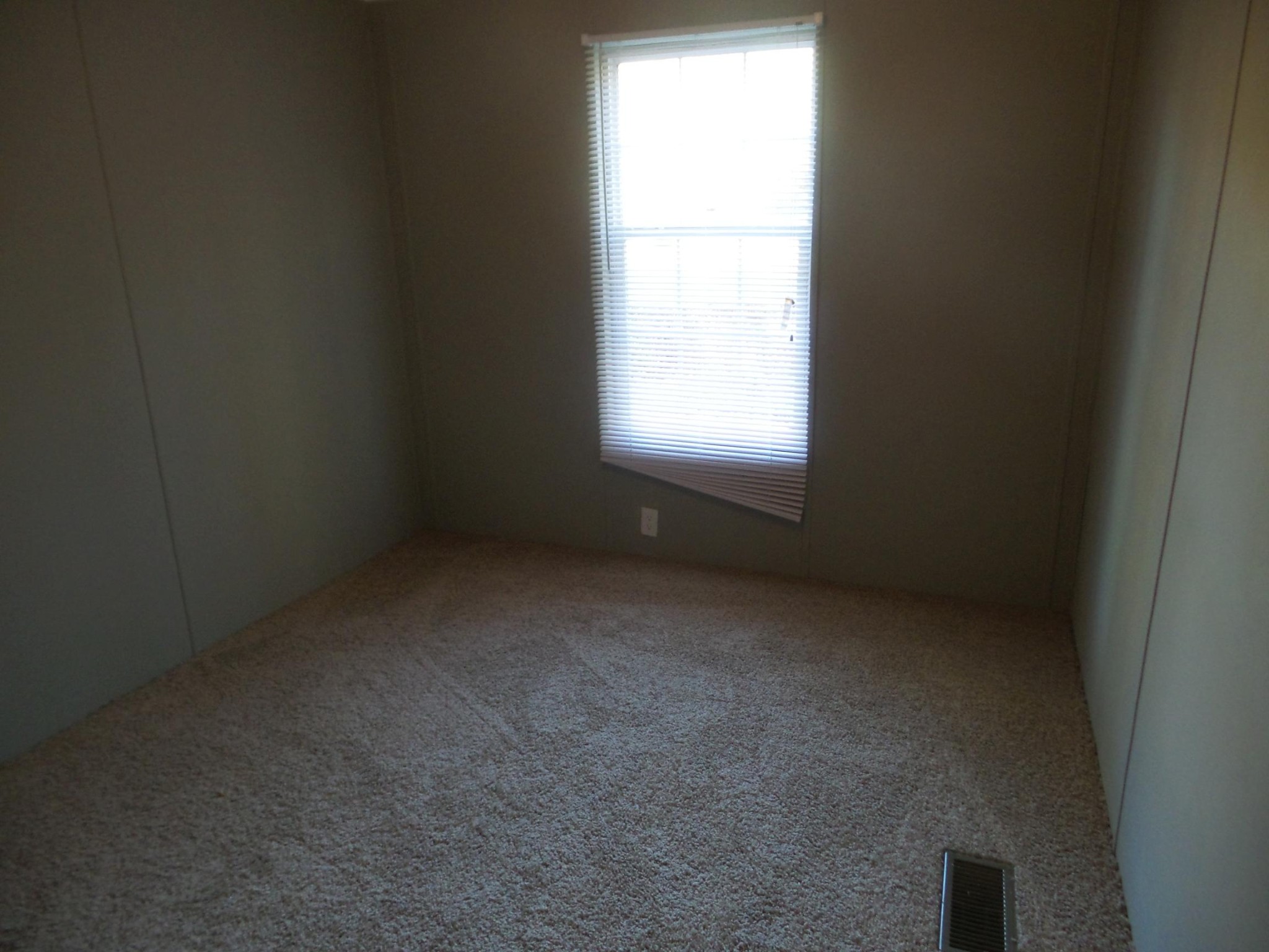386 Ideal Valley Road Spring City, TN 37381 - Photo 9 of 12 a view of an empty room with a window
