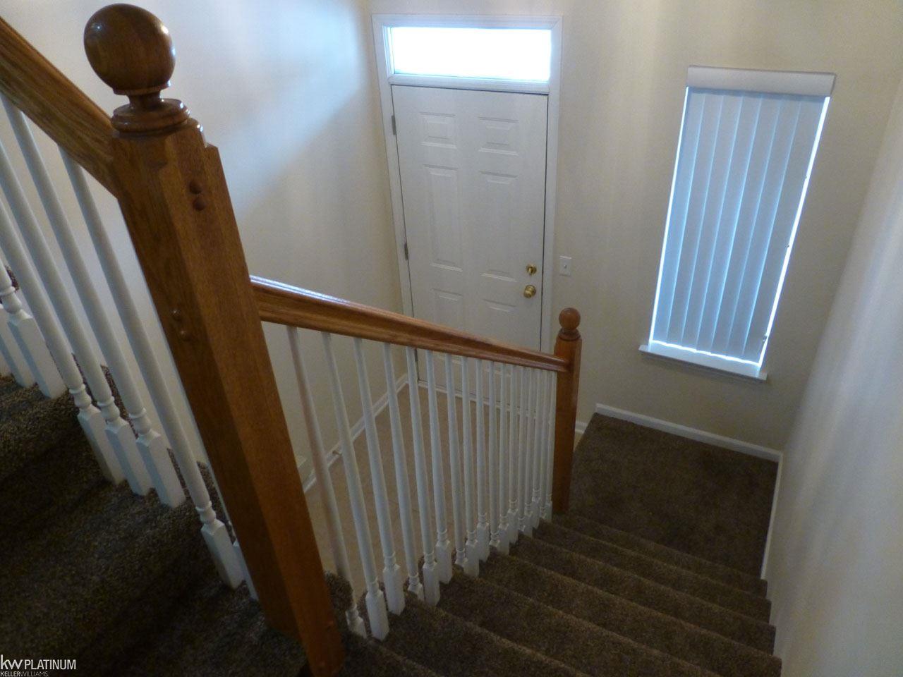 3643 Oakmonte Boulevard Rochester, MI 48306 - Photo 18 of 47 Stairwell from front porch entrance