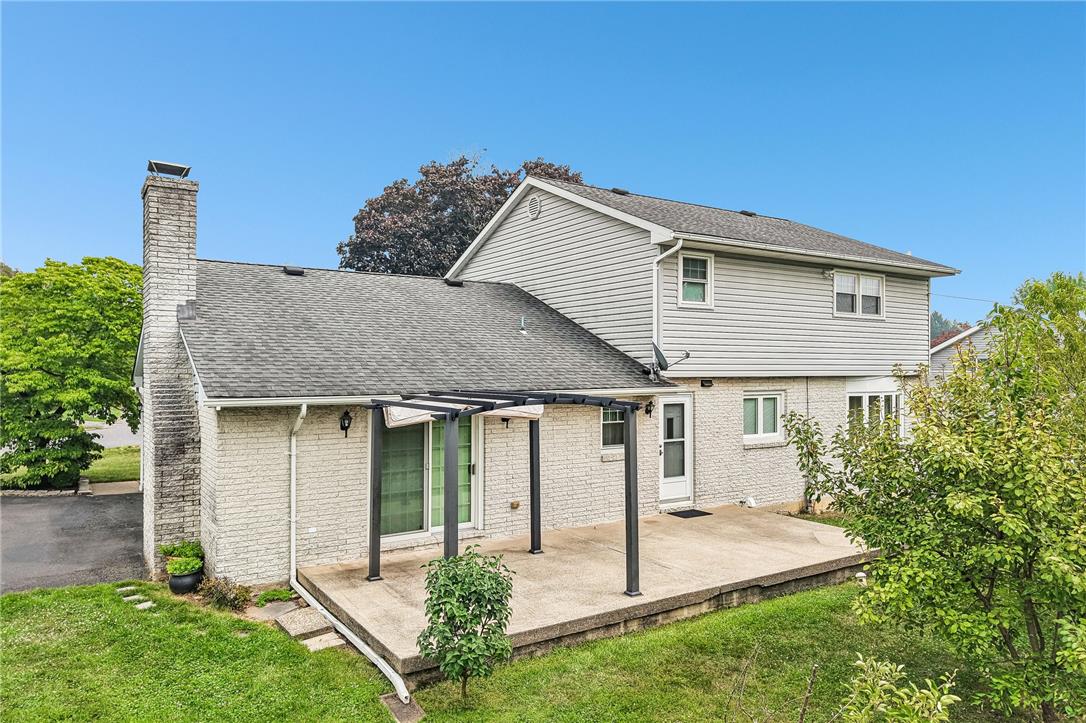 3659 Ironstone Road Bethlehem, PA 18020 - Photo 51 of 52 A private rear patio extends the living space, perfect for outdoor enjoyment.