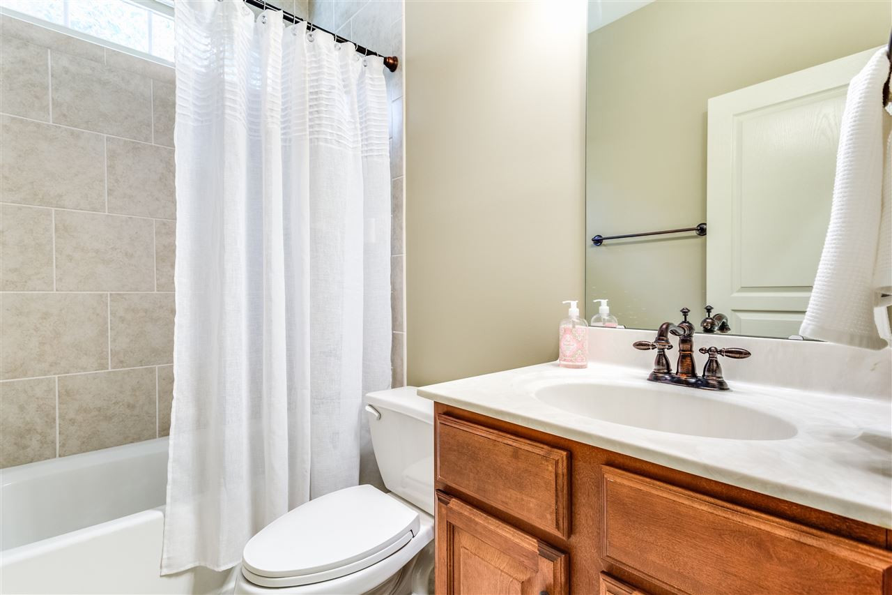 3509 Griffice Mill Road Raleigh, NC 27610 - Photo 7 of 20 1st floor full guest bath with ceramic tile and ORB hardware. Bathroom