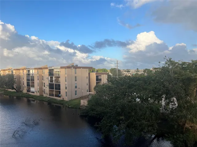 a view of a lake with a city