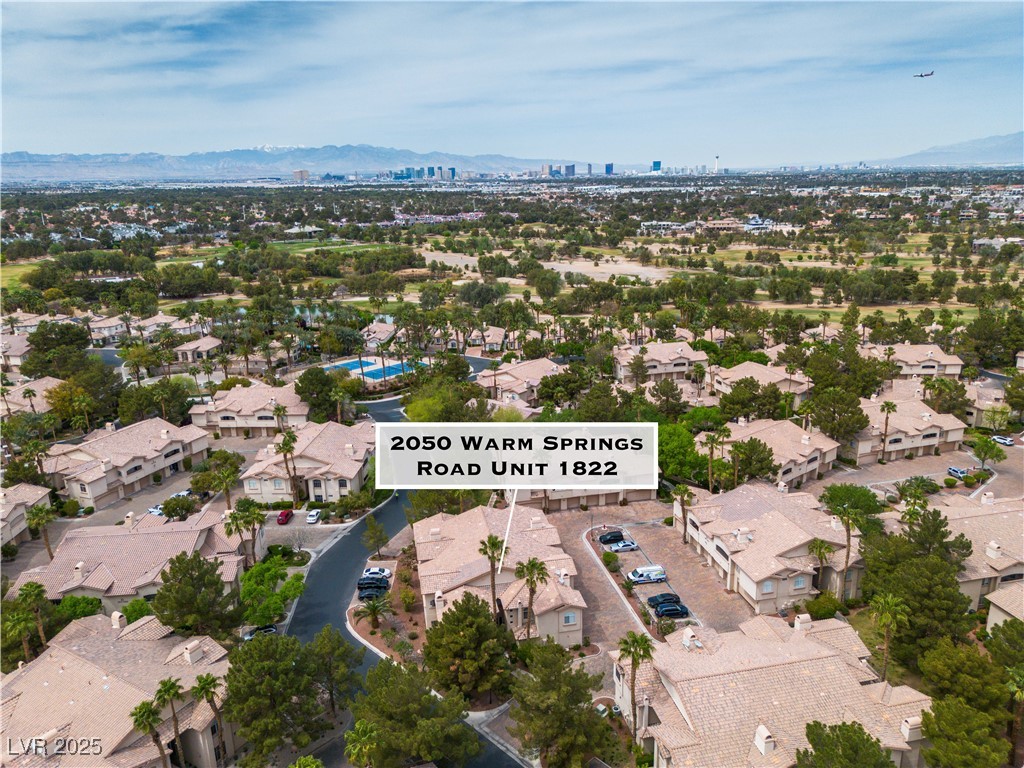2050 West Warm Springs Road, Unit 1822 Henderson, NV 89014 - Photo 46 of 55 Drone / aerial view featuring a mountain view and a residential view