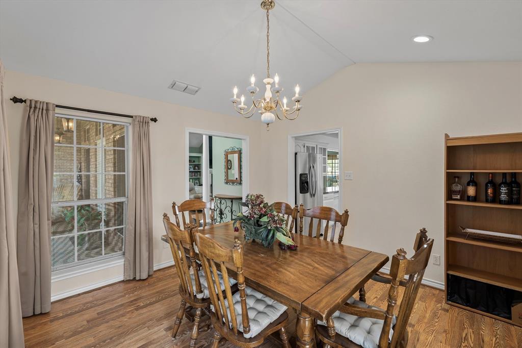 271 VZ County Road Canton, TX 75103 - Photo 13 of 40 a view of a dining room with furniture wooden floor and chandelier
