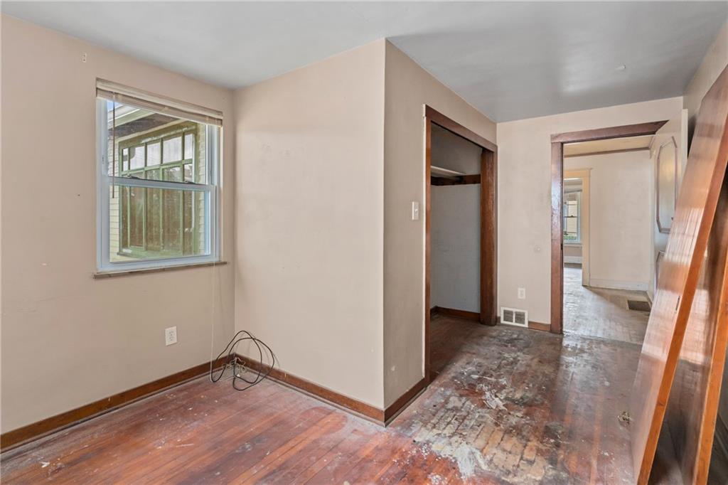 214 Sarah Street McKees Rocks, PA 15136 - Photo 18 of 28 an empty room with windows and closet