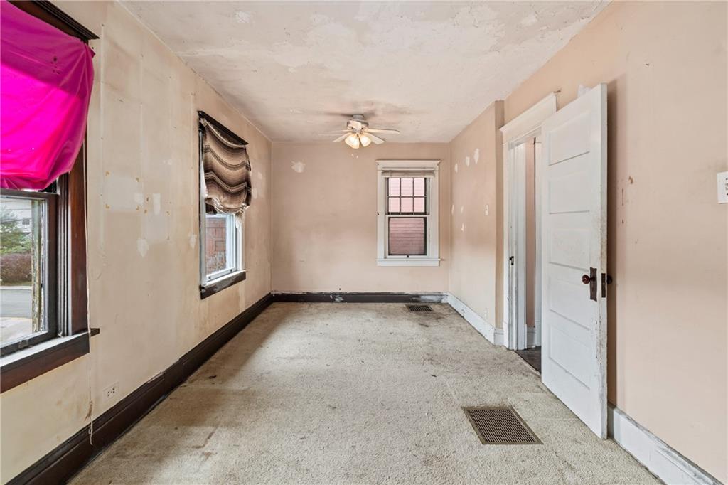 214 Sarah Street McKees Rocks, PA 15136 - Photo 20 of 28 a view of a livingroom with a staircase