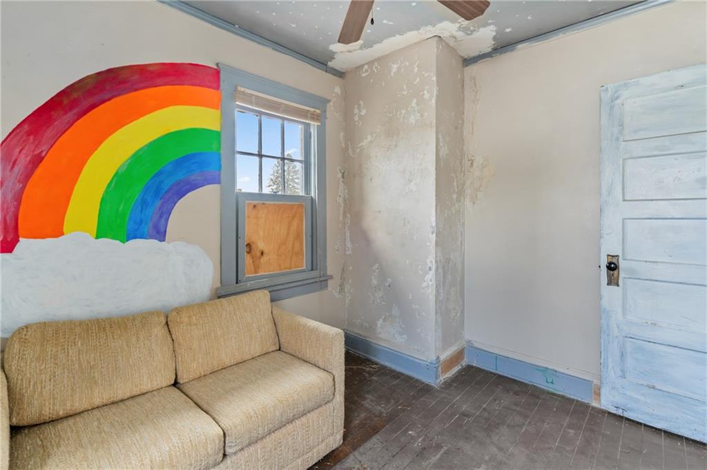 214 Sarah Street McKees Rocks, PA 15136 - Photo 23 of 28 a living room with a couch and rug