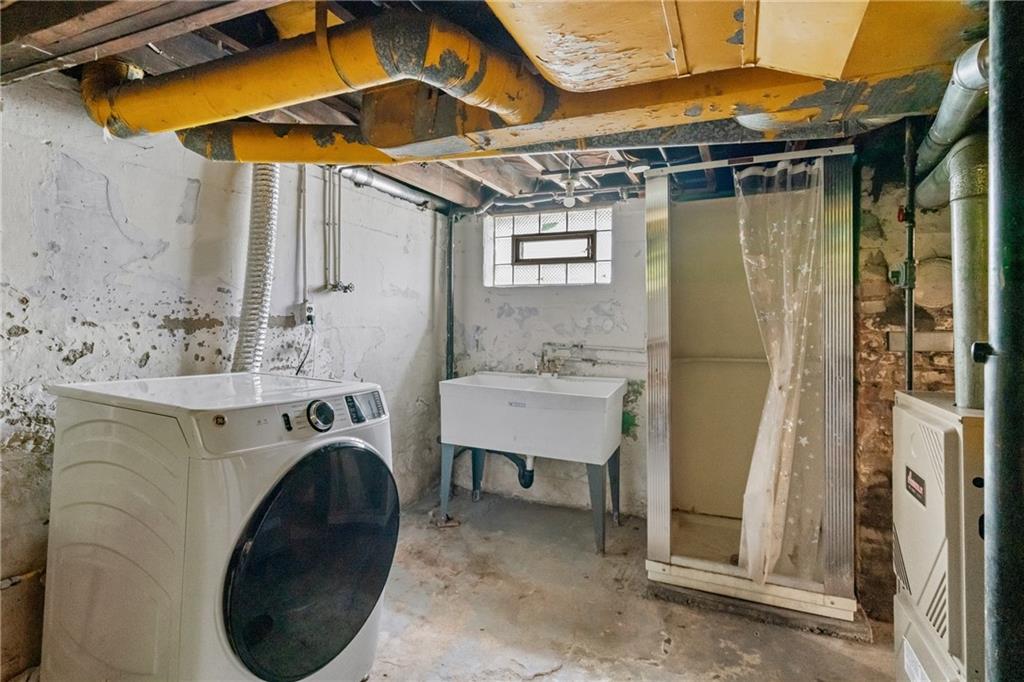 214 Sarah Street McKees Rocks, PA 15136 - Photo 27 of 28 a utility room with dryer and washer