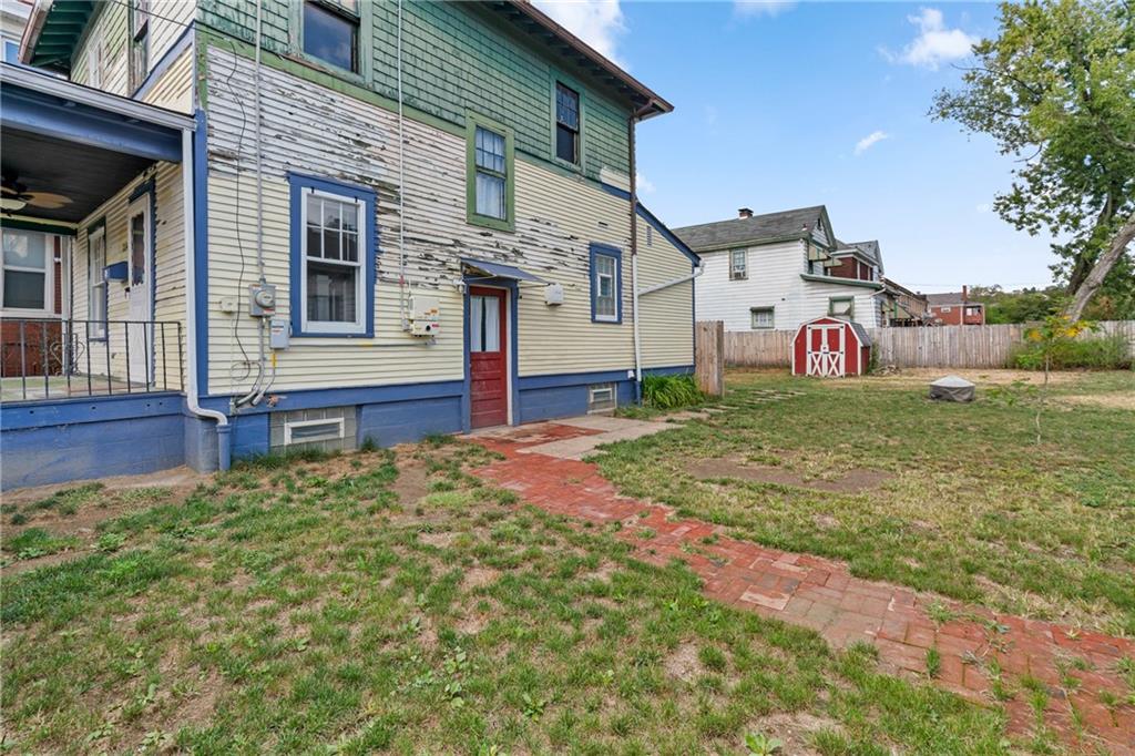 214 Sarah Street McKees Rocks, PA 15136 - Photo 4 of 28 a view of a house with a yard