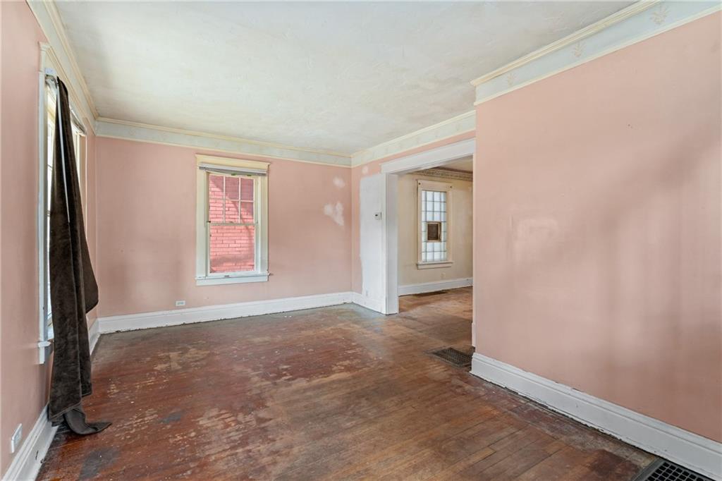 214 Sarah Street McKees Rocks, PA 15136 - Photo 7 of 28 an empty room with windows