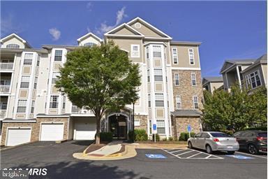 508 Sunset View Terrace Southeast, Unit 205 Leesburg, VA 20175 - Photo 1 of 28 a front view of a building with street view