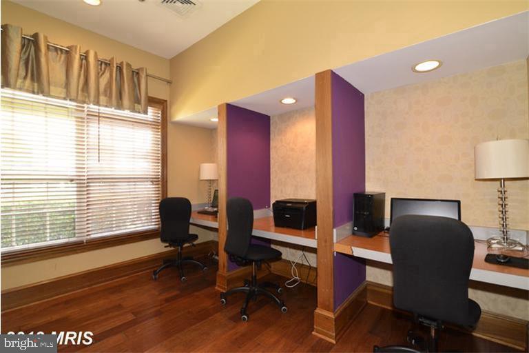 508 Sunset View Terrace Southeast, Unit 205 Leesburg, VA 20175 - Photo 26 of 28 a view of a workspace with furniture and a window