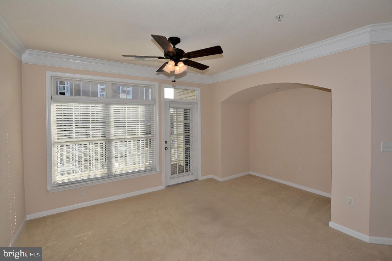 508 Sunset View Terrace Southeast, Unit 205 Leesburg, VA 20175 - Photo 27 of 28 a view of an empty room with a window