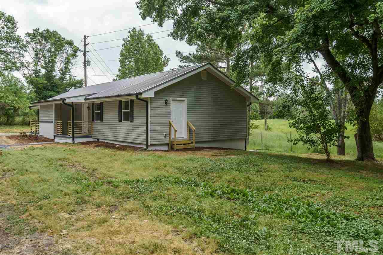 1421 Creech Road Garner, NC 27529 - Photo 23 of 23 a backyard of a house with lots of green space