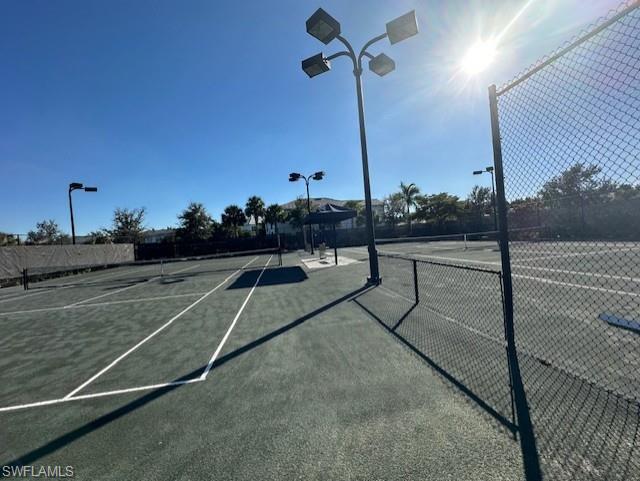 8980 Mustique Lane Naples, FL 34114 - Photo 47 of 50 View of tennis courts