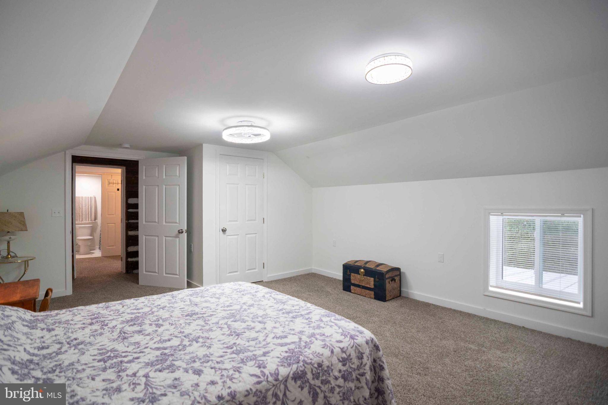 2002 Balkamore Hill Road Stanley, VA 22851 - Photo 19 of 36 a bedroom with a bed and a window