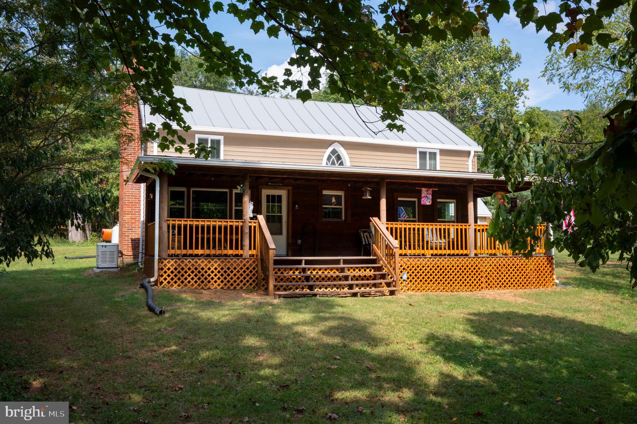 2002 Balkamore Hill Road Stanley, VA 22851 - Photo 28 of 36 a front view of a house with garden