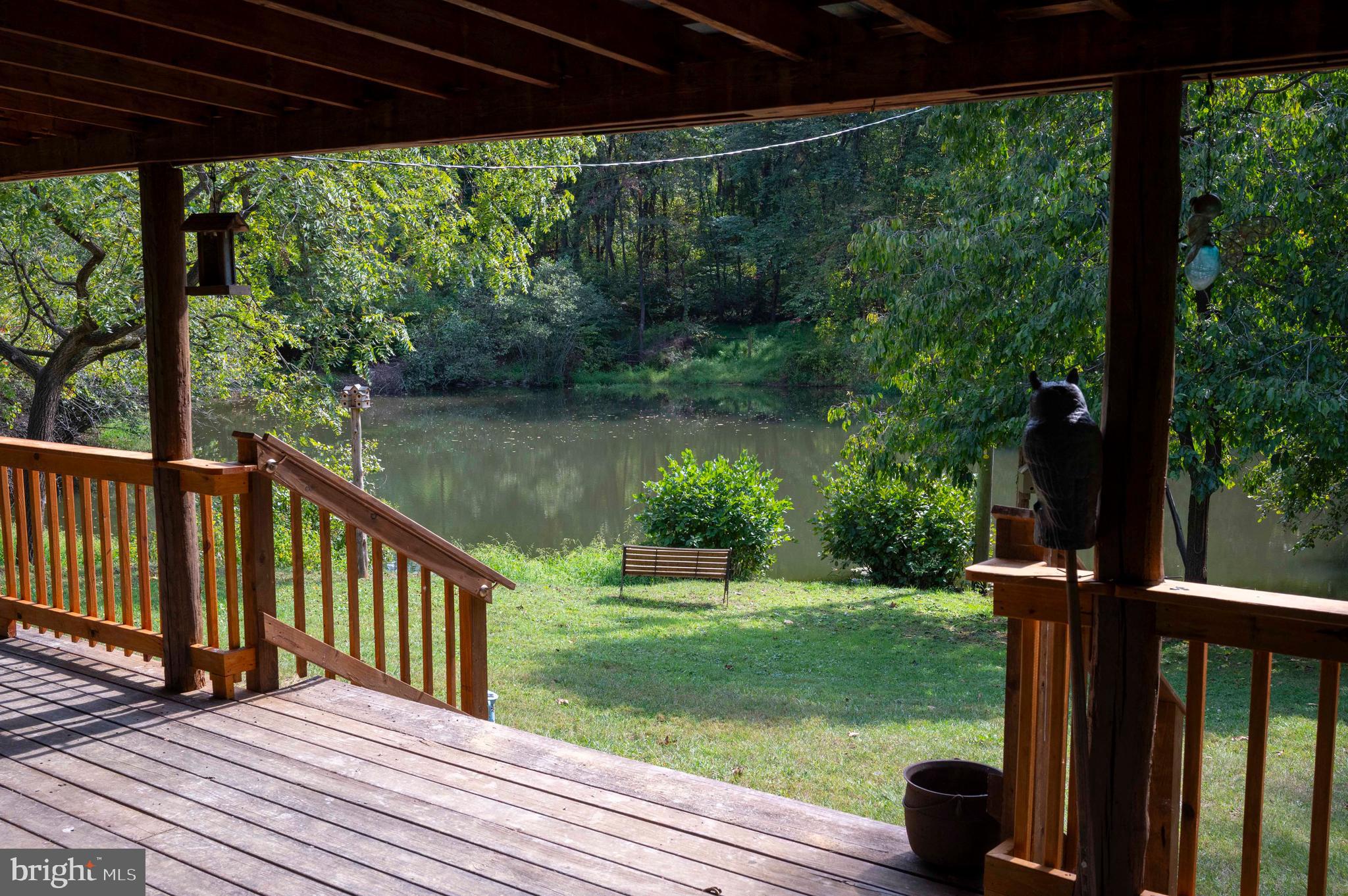 2002 Balkamore Hill Road Stanley, VA 22851 - Photo 29 of 36 a view of a backyard with wooden floor and outdoor seating