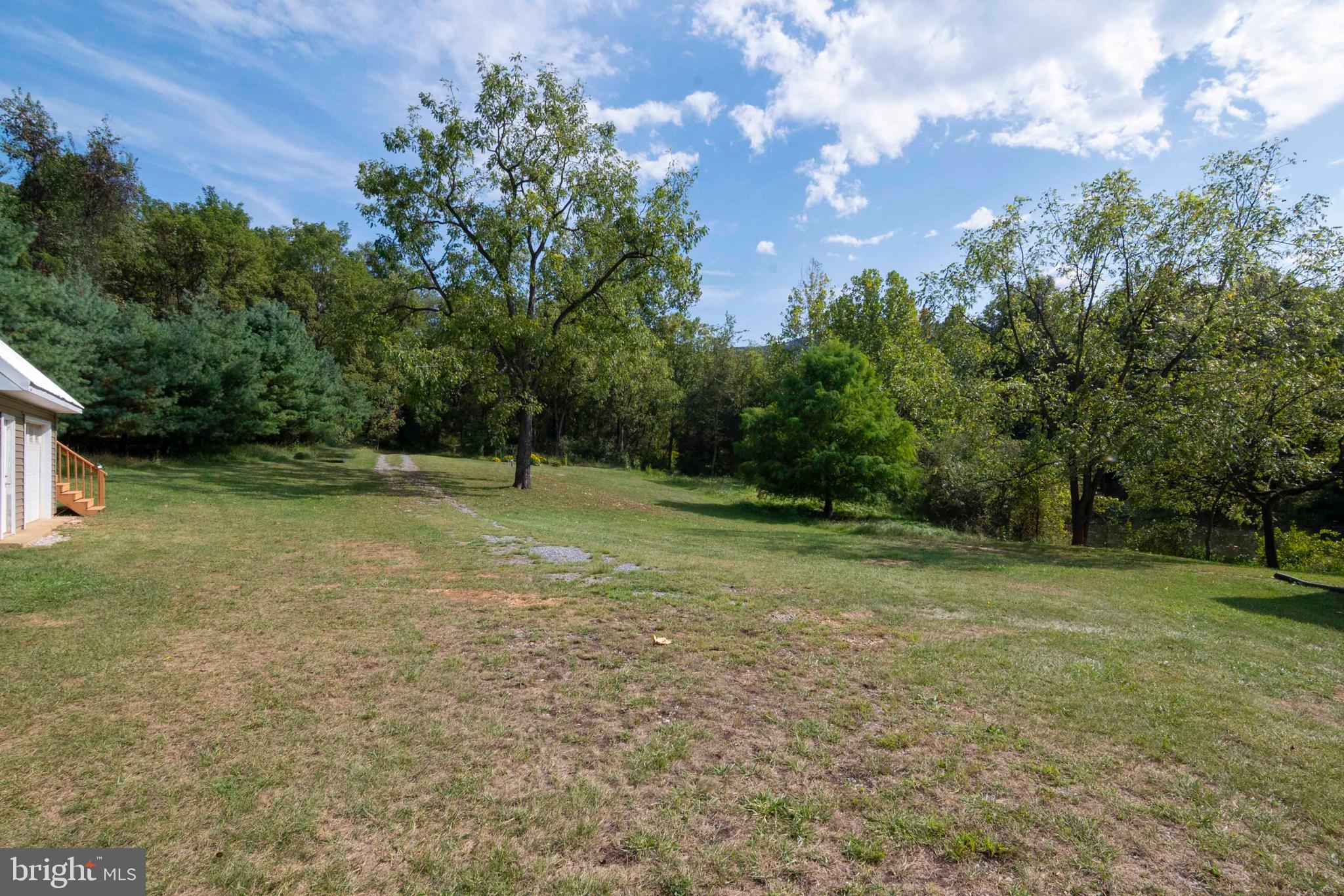 2002 Balkamore Hill Road Stanley, VA 22851 - Photo 5 of 36 a view of outdoor space with deck and yard