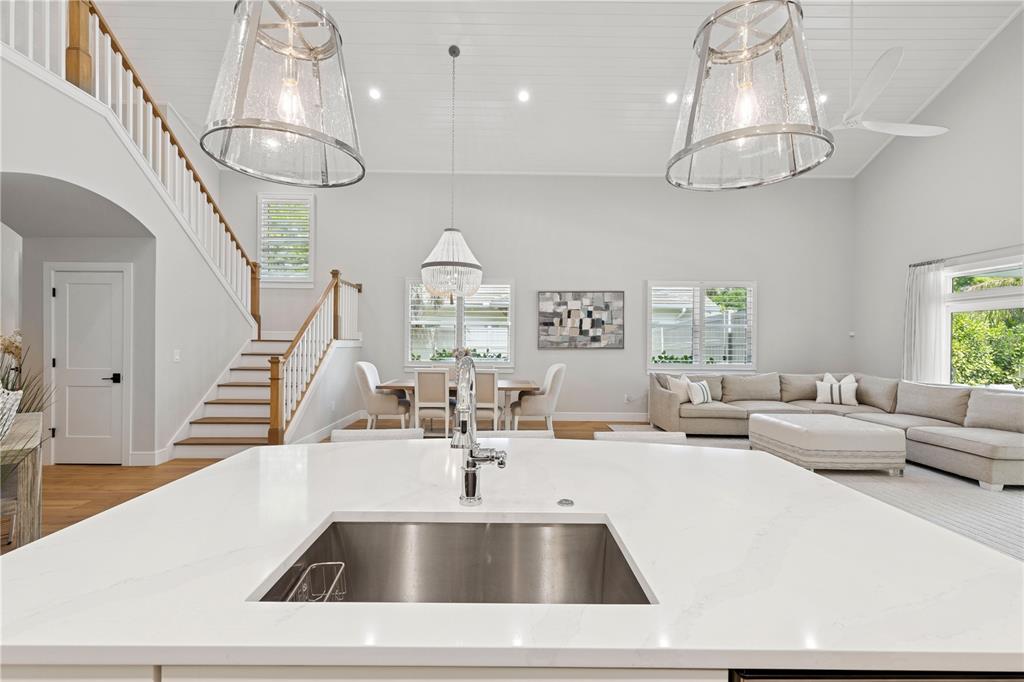 4013 Red Rock Lane Sarasota, FL 34231 - Photo 17 of 60 a kitchen with a table chairs and couches
